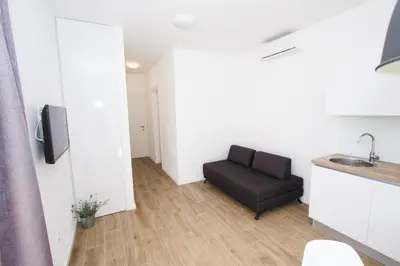 TV i/ili zabavni centar u objektu Apartment in Vodice with terrace, air conditioning, WiFi, dishwasher, Pool 4932-4
