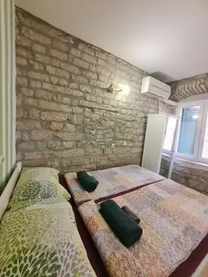 Krevet ili kreveti u jedinici u objektu Rooms & Studio Apartments Šibenik