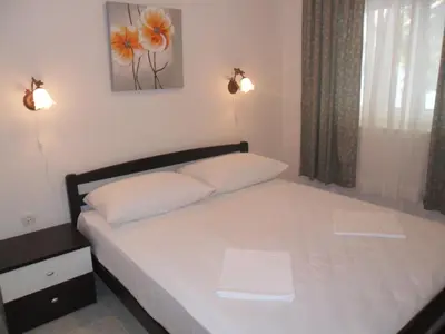 Krevet ili kreveti u jedinici u objektu Apartments by the sea Rogoznica - 18158