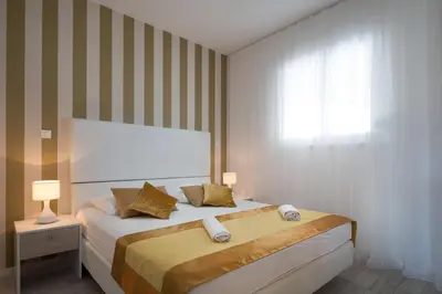 Krevet ili kreveti u jedinici u objektu Perla Resort