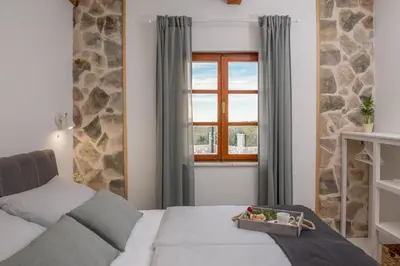 Krevet ili kreveti u jedinici u objektu Family friendly house with a swimming pool Stupin Celine, Rogoznica - 18194