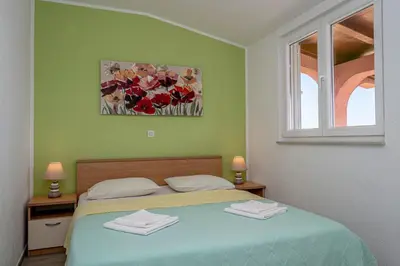 Krevet ili kreveti u jedinici u objektu Seaview & Balcony Apartment PETRA