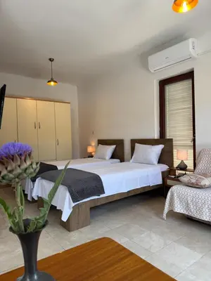 Krevet ili kreveti u jedinici u objektu Private studio apartment with a garden and a terrace