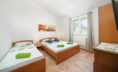Krevet ili kreveti u jedinici u objektu Apartments Markunović