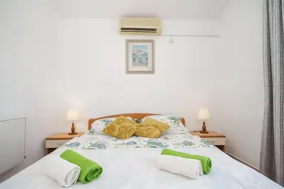 Krevet ili kreveti u jedinici u objektu Apartments Markunović
