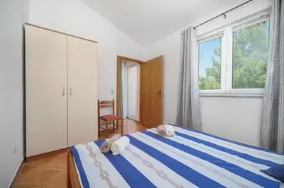 Krevet ili kreveti u jedinici u objektu Apartments Markunović