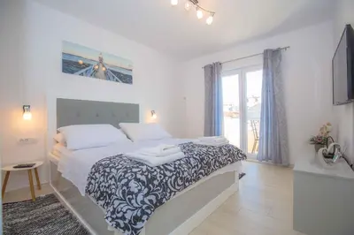 Krevet ili kreveti u jedinici u objektu Apartments in Rogoznica 40364