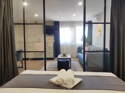 Krevet ili kreveti u jedinici u objektu Botun Luxury Apartment