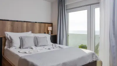 Krevet ili kreveti u jedinici u objektu Villa Esquel - Beachfront, heated pool