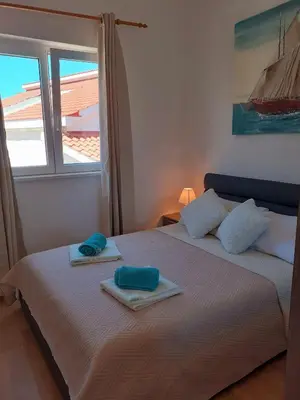 Krevet ili kreveti u jedinici u objektu Apartman L&M
