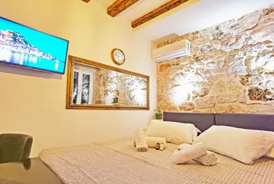 Krevet ili kreveti u jedinici u objektu Pearl Stone Apartments