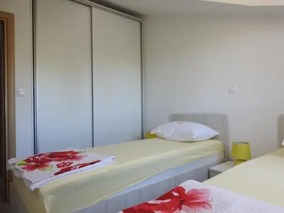 Krevet ili kreveti u jedinici u objektu Apartmani Hrvoje Klarić - Srima