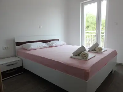 Krevet ili kreveti u jedinici u objektu Apartmani Hrvoje Klarić - Srima