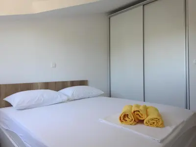 Krevet ili kreveti u jedinici u objektu Apartmani Hrvoje Klarić - Srima