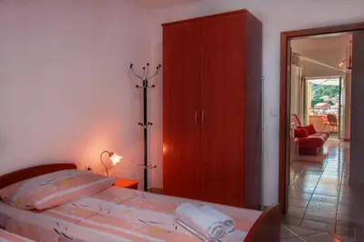 Krevet ili kreveti u jedinici u objektu Apartmenthaus Kosirina-Tisno
