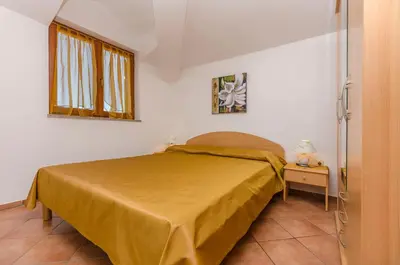 Krevet ili kreveti u jedinici u objektu Apartments Villa Estella