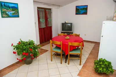 TV i/ili zabavni centar u objektu Apartments Villa Estella