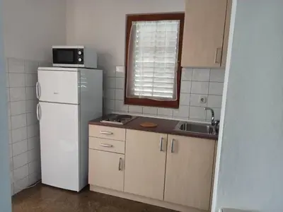 Kuhinja ili čajna kuhinja u objektu Vodice, apartmani Buntić