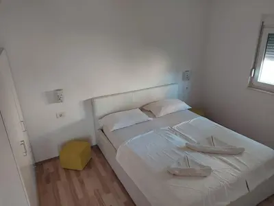 Krevet ili kreveti u jedinici u objektu APARTMANI BELVEDERE BILO
