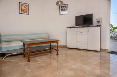 TV i/ili zabavni centar u objektu Apartments Vito