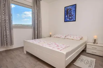 Krevet ili kreveti u jedinici u objektu Apartments Vito