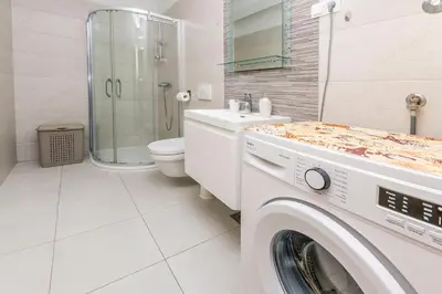Kupaonica u objektu Apartments Osti