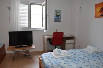 TV i/ili zabavni centar u objektu Apartmani Meri