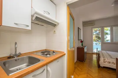 Krevet ili kreveti u jedinici u objektu Apartment and Rooms Franka