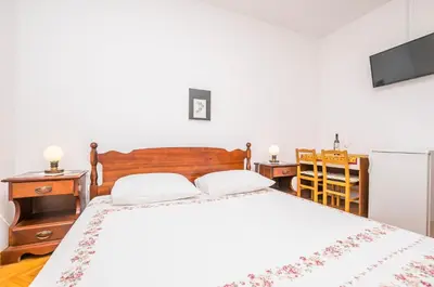 Krevet ili kreveti u jedinici u objektu Apartment and Rooms Franka