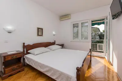 Krevet ili kreveti u jedinici u objektu Apartment and Rooms Franka