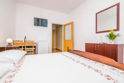 Krevet ili kreveti u jedinici u objektu Apartment and Rooms Franka