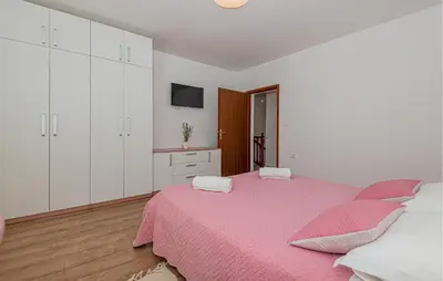 Krevet ili kreveti u jedinici u objektu Awesome Home In Sibenik