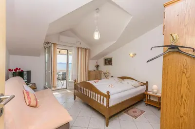 Krevet ili kreveti u jedinici u objektu Apartments Ivanka on the beach