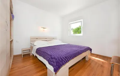 Krevet ili kreveti u jedinici u objektu Stunning Home In Rogoznica
