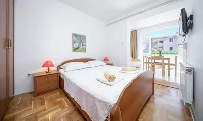Krevet ili kreveti u jedinici u objektu Apartments Nostro Palazzo
