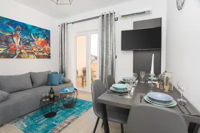 TV i/ili zabavni centar u objektu Apartmani Rišpet