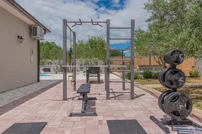 Fitness centar i/ili fitness sadržaji u objektu Holiday Home Intrade
