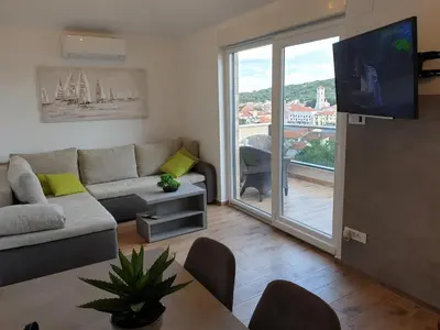 TV i/ili zabavni centar u objektu Starfish - Apartman Tisno