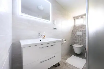 Kupaonica u objektu Apartmani Gojević