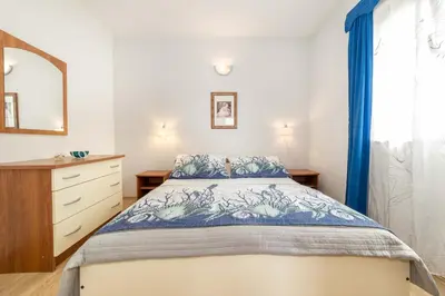 Krevet ili kreveti u jedinici u objektu Apartments Petranić