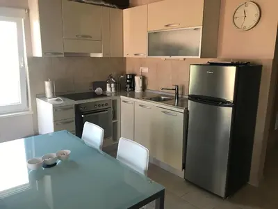 Kuhinja ili čajna kuhinja u objektu Apartments Maslina
