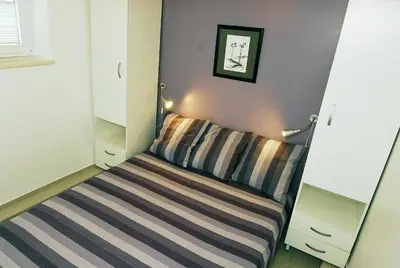 Krevet ili kreveti u jedinici u objektu Apartments Maslina