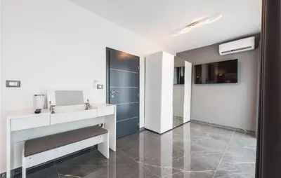 TV i/ili zabavni centar u objektu Beach Front Home In Srima