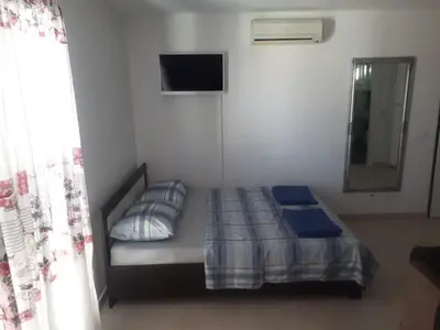 Krevet ili kreveti u jedinici u objektu STUDIO APARTMAN LABRADOR
