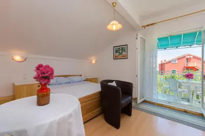 Krevet ili kreveti u jedinici u objektu Apartments Mirjana Blue Beach