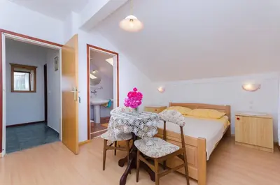 Krevet ili kreveti u jedinici u objektu Apartments Mirjana Blue Beach