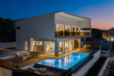 Bazen u objektu Villa Ramarin 1 with heated pool, jacuzzi and sauna by the sea in Rogoznica ili u blizini