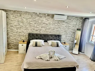 Krevet ili kreveti u jedinici u objektu Primadonna Apartments