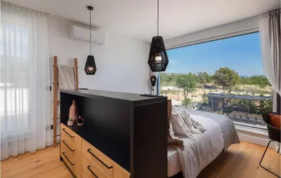 Krevet ili kreveti u jedinici u objektu Stunning Home In Dubrava With Sauna