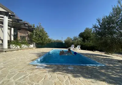 Bazen u objektu Villa Bubica- cozy holiday home in rural area with pool ili u blizini